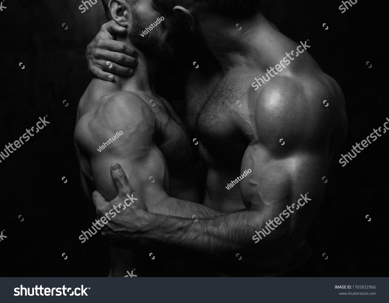 2 men kissing naked