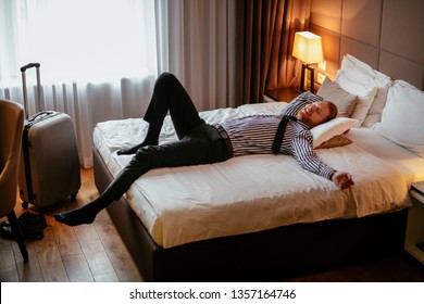 man tied to bed