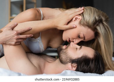 brandon dewitte recommends women kissing breasts pic